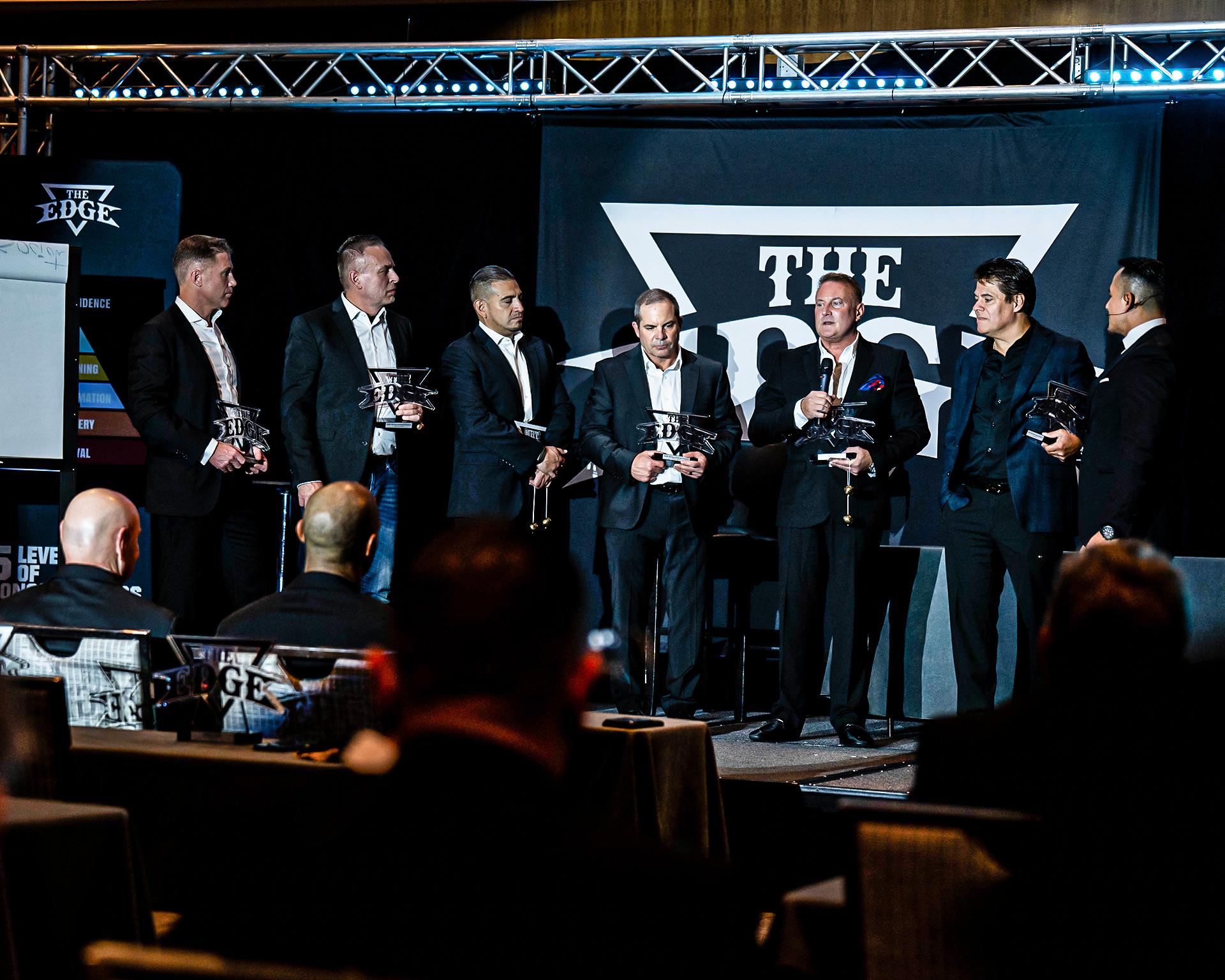 EDGE leadership summit participants standing together after completing the challenge, united in purpose and power.