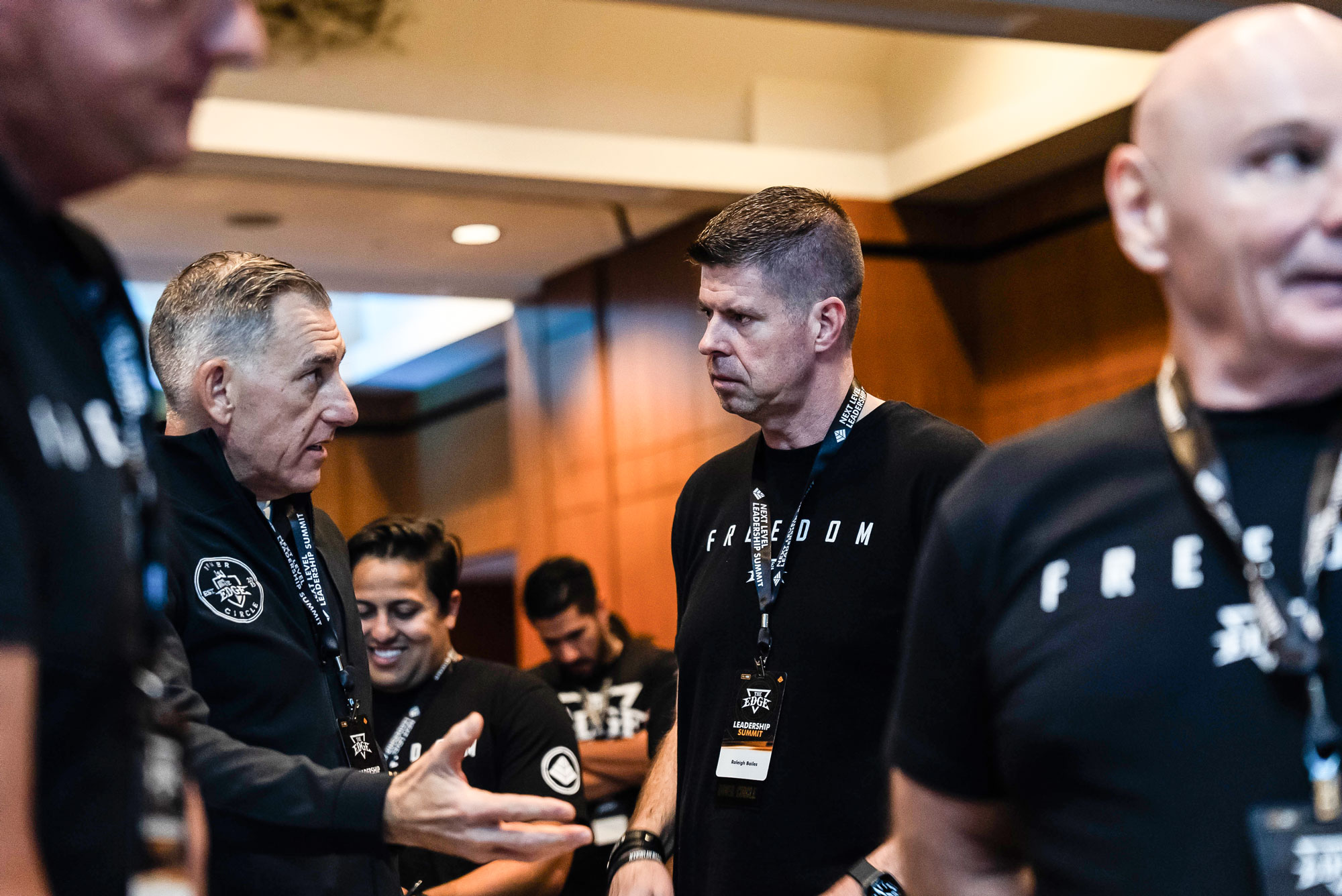 Group of men in the EDGE brotherhood sharing powerful breakthroughs in a supportive circle.